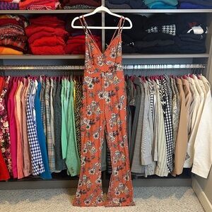 Derek Heart terracotta floral elastic waistband v neck flare leg jumpsuit size S